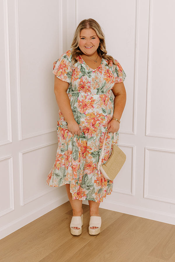 mint floral midi dress Easy breezy, this mint organza midi dress is cut with an effortless silhouette that's belted to flatter the form. Its scarf-inspired floral print lends vibrant appeal ready for fun in the