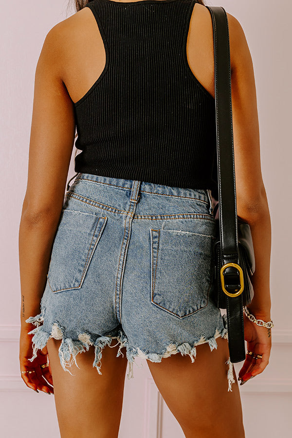 The Kira High Waist Destroyed Shorts in Light Wash