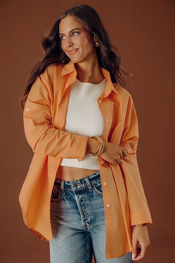 Sending Good Luck Button Up Top In Orange Image - 1