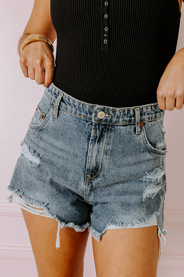 The Winnow High Waist Distressed Shorts In Medium Wash