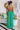 Private Jet Hopping Smocked Jumpsuit in Emerald