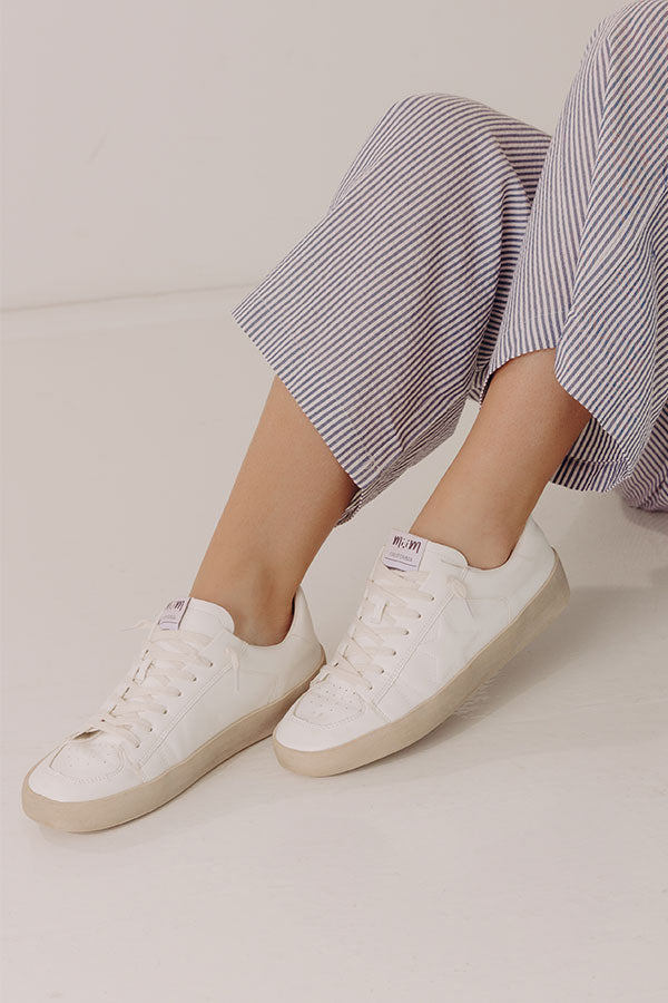 The Brylee Faux Leather Sneaker in Ivory