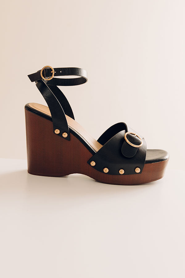 The Trisha Faux Leather Wedge in Black