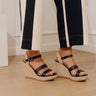 The Alana Faux Leather Wedge in Black Image - 1