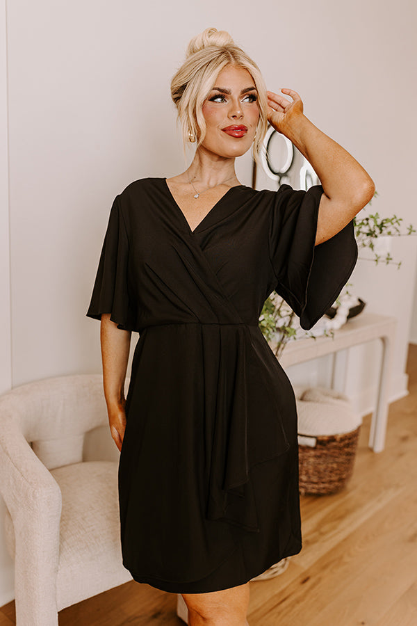 Classy Girl Faux Wrap Mini Dress in Black Curves Impressions Online Boutique Classy Girl Faux Wrap Mini Dress in Black Curves Impressions Online Boutique