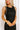 Uptown Chic Pearl Embellished Mini Dress in Black