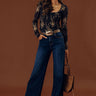Slowly Falling For You Smocked Mesh Top in Black Image - 1