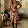 Joyful Smiles Smocked Mini Dress in Cinnamon Image - 1