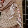 Chic Cityscape Faux Leather Woven Tote in Warm Taupe Image - 1