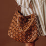 Chic Cityscape Faux Leather Woven Tote in Brown Image - 1