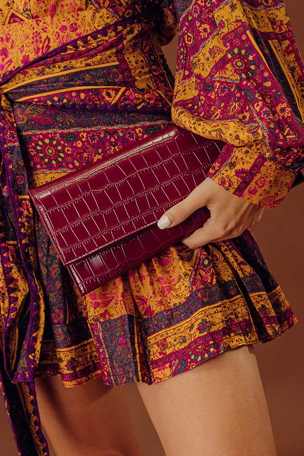 Fashionably Late Faux Leather Clutch in Wine