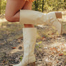 The Elliana Faux Leather Knee High Boot In French Vanilla Image - 1
