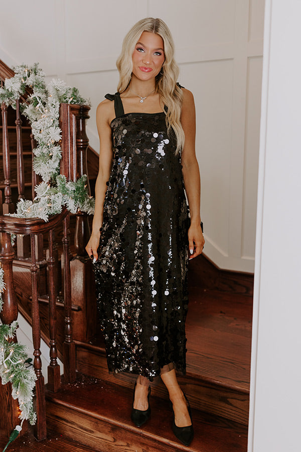 midi black sequin dress Glamorous Nights - turning piece with strappy metallic heels and a clutch bag for a night out in the city Sequin Bodycon Midi Dress Black