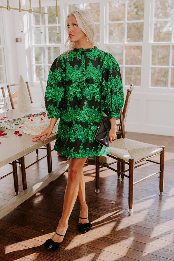 dress that's floral, long sleeve, and green