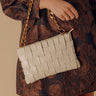 Mimie Vegan Leather Woven Crossbody Bag in Rose Gold Image - 1