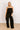  black Martinis Please Ruffle Jumpsuit 