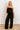  black Martinis Please Ruffle Jumpsuit 