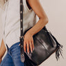Metropolitan Muse Faux Leather Fringe Purse in Black Image - 1