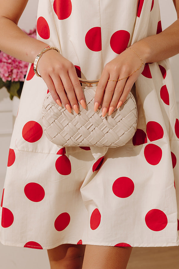 The Rya Faux Leather Woven Clutch in Cream