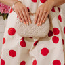 The Rya Faux Leather Woven Clutch in Cream Image - 1