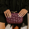 The Rya Faux Leather Woven Clutch in Windsor Wine Image 1