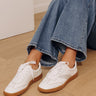 Wylder Faux Leather Studded Sneaker in White Image - 1