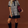Brunch Plans Ready Eyelet Mini Dress in Black Image - 1