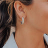 Glistening Smile Pave Hoop Earrings in Silver Image - 1