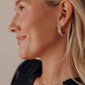 Glistening Smile Pave Hoop Earrings in Silver Image - 1