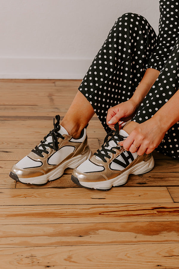 The Dash Faux Leather Sneaker in Gold