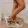 The Dash Faux Leather Sneaker in Gold Image - 1