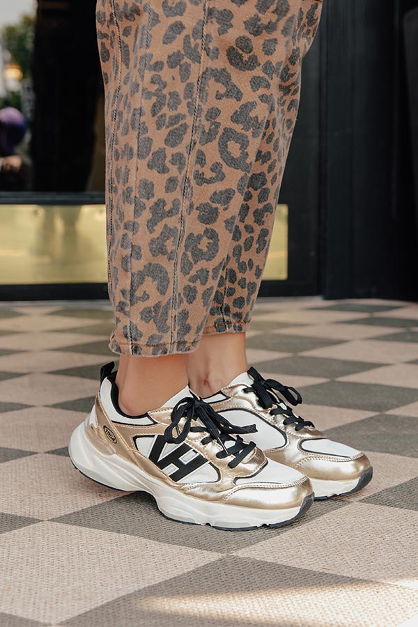 The Dash Faux Leather Sneaker in Gold