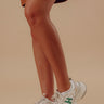 The Dash Faux Leather Sneaker in White Image - 1