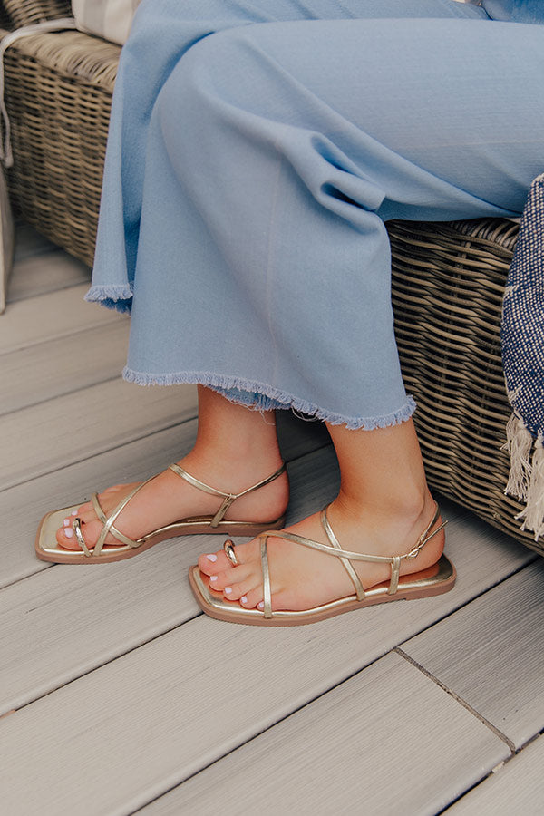 The Lucia Faux Leather Metallic Sandal in Gold Image - 1