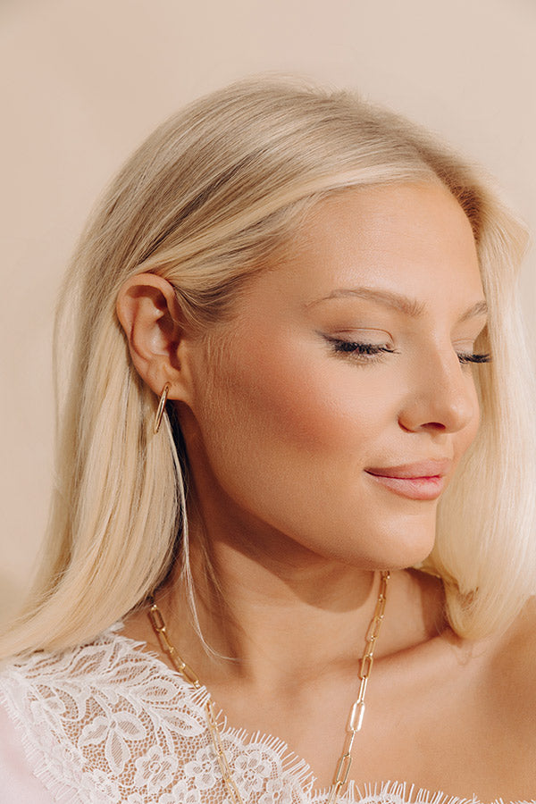 Melinda Maria Beacon 1 inch Hoop Earrings in Gold Image - 1