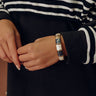 On Holiday Hinge Bangle Bracelet in Black Image - 1