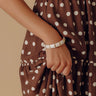 On Holiday Hinge Bangle Bracelet in Champagne Image - 1