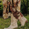 The Lorelai Faux Leather Cut-Out Cowboy Boots in Stone Image - 1