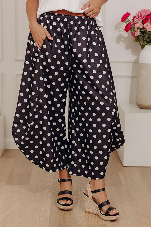 The Rowena Midrise Polka Dot Barrel Leg Pants in Black Image - 1