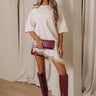 Times Square Chic Asymmetrical Lace Trim Top in French Vanilla Image - 1
