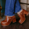 The Sawyer Faux Leather Platform Clogs in Brown Image - 1