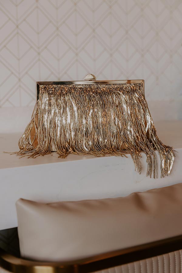Celestia Sequin Fringe Clutch in Gold