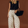 Brunch Date Chic Bubble Hem Top in Black Image - 1