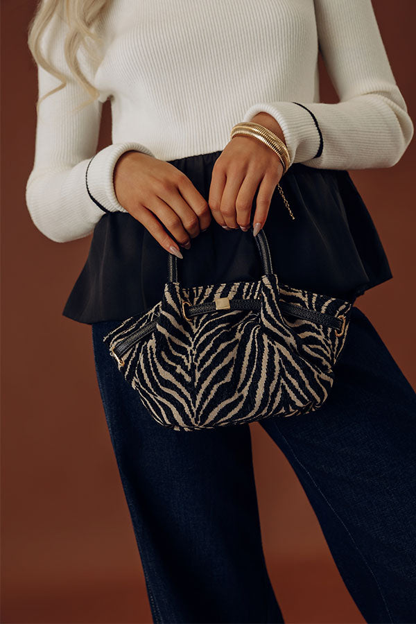 The Selena Woven Purse in Zebra Print Image - 1