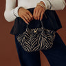 The Selena Woven Purse in Zebra Print Image - 1