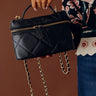 Snow Faux Leather Quilted Crossbody in Black Image - 1