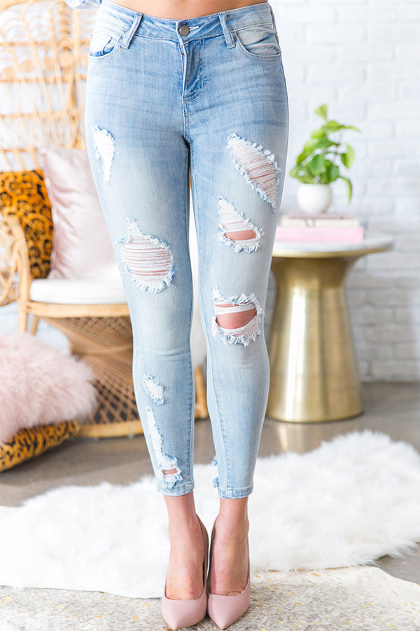 The Palm Beach Mid Rise Distressed Skinny in Light Wash