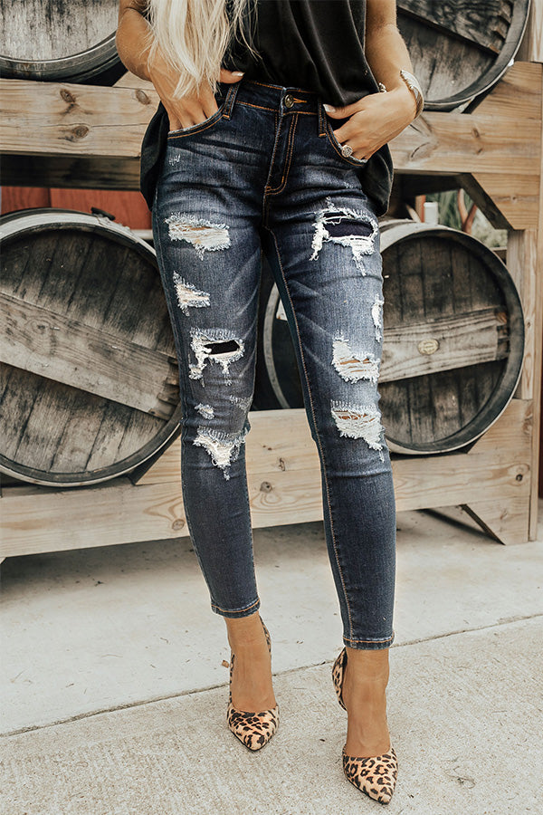 The Sarah Mid Rise Distressed Skinny