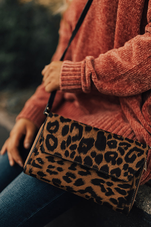 On The Run Leopard Clutch
