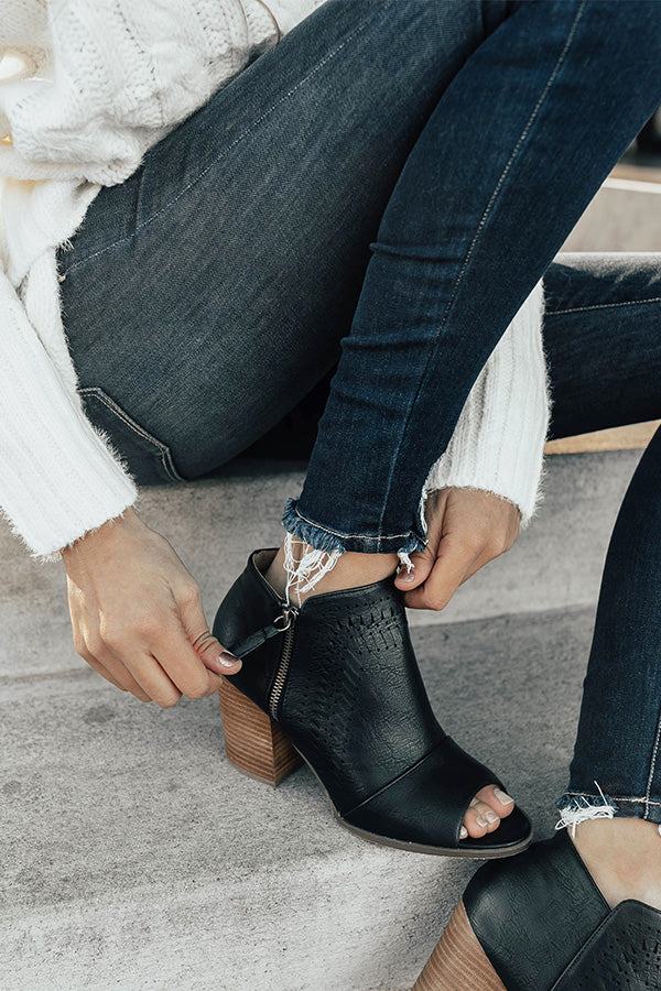 The Baylor Faux Leather Peep Toe Bootie In Black